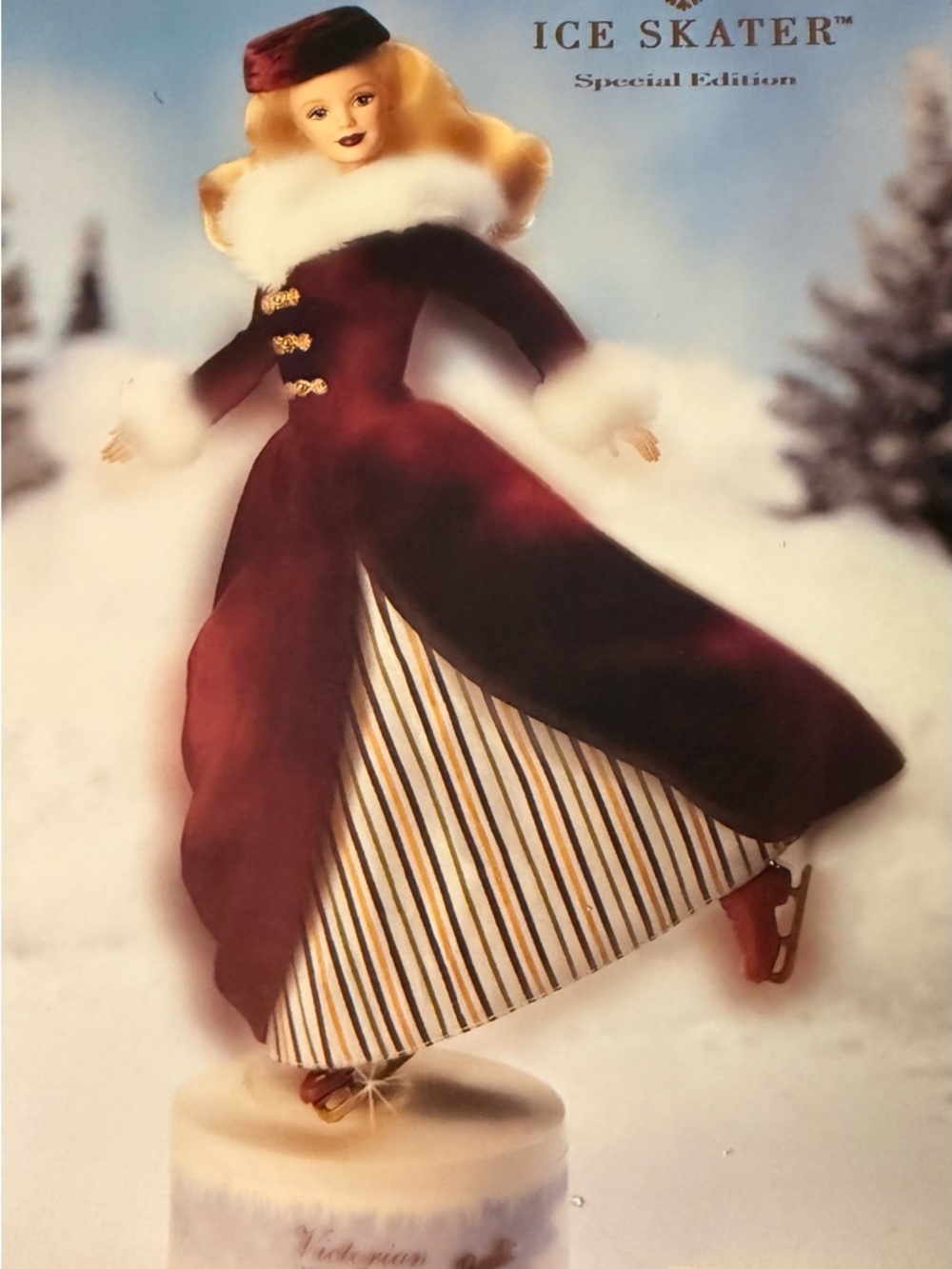 Ice Skater Special Edition Porcelain Figurine in Deep Burgundy and Gold